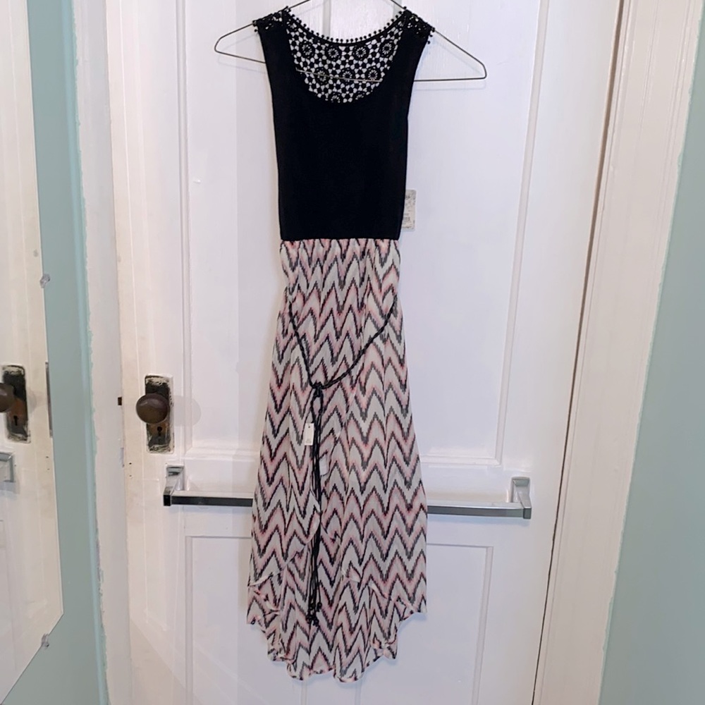 girls black with pink/black/white stripes, floral netted design back